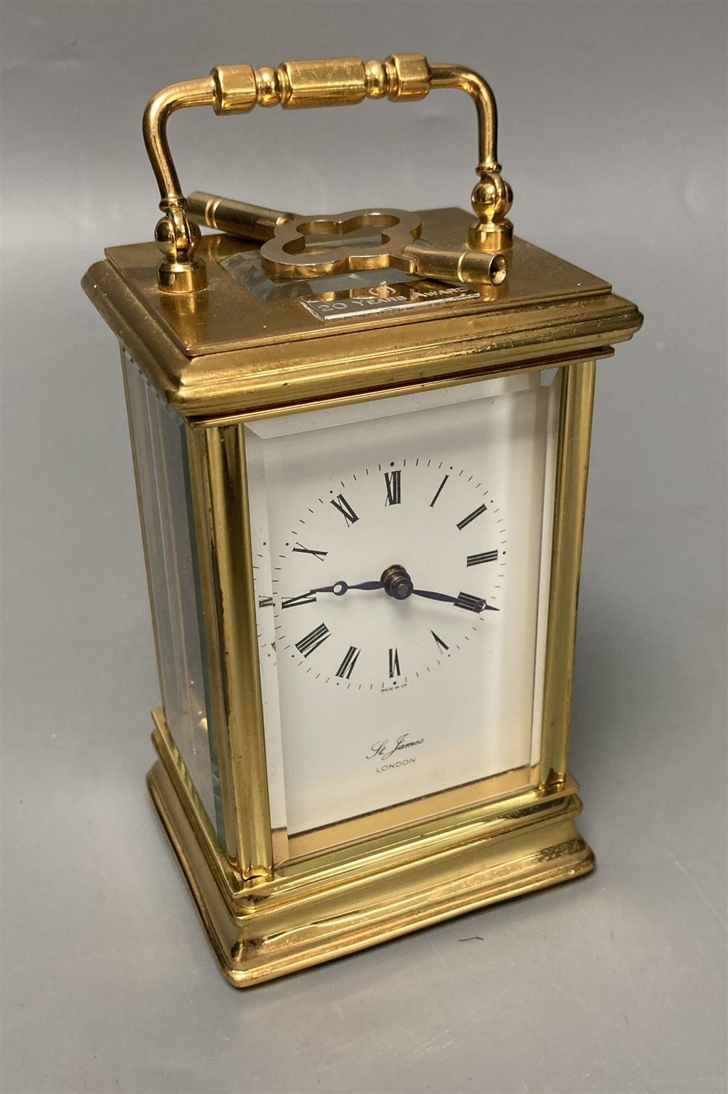 A modern French brass cased eight day presentation carriage timepiece